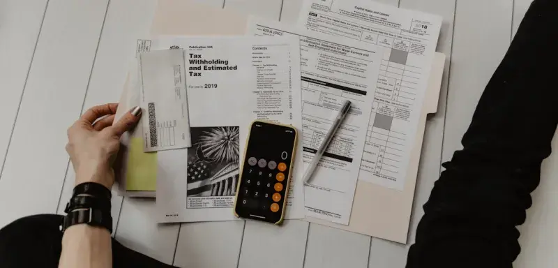 Calculatrice et documents fiscaux - Nouvel impôt sur les hauts revenus