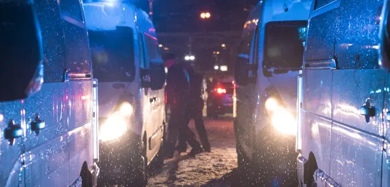 a group of trucks parked next to each other
