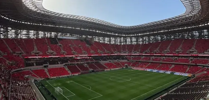 Stunning aerial shot of a vibrant stadium filled with fans in Morocco.