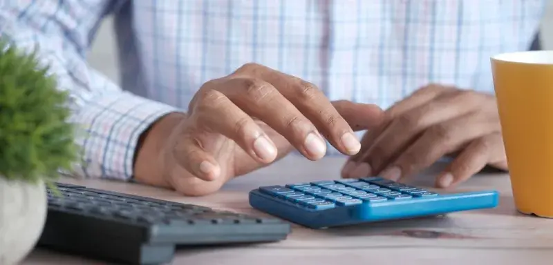 person using black computer keyboard