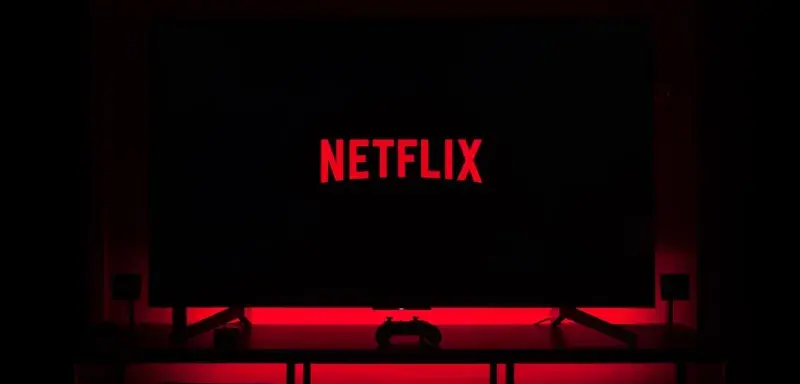 flat screen television displaying Netflix logo