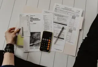 Calculatrice et documents fiscaux - Nouvel impôt sur les hauts revenus