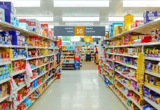 a grocery store aisle filled with lots of food