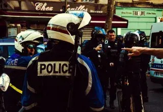 man in blue and white jacket wearing white helmet